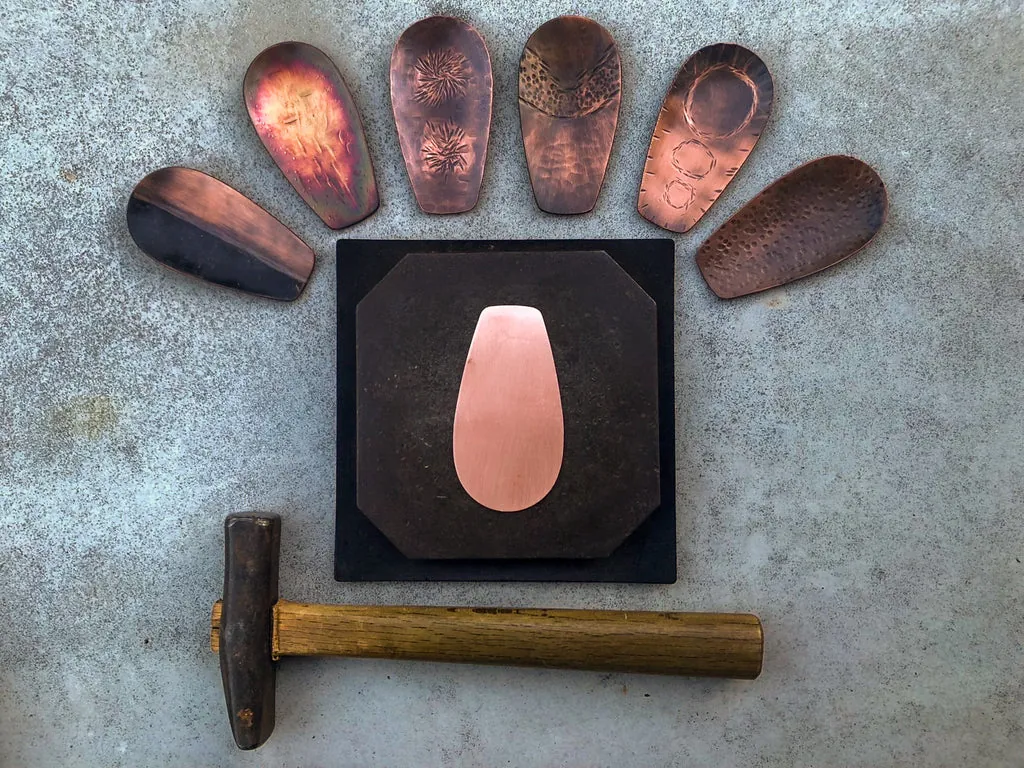 Hand-hammered copper tea scoop showing the distinctive texture of traditional craftsmanship