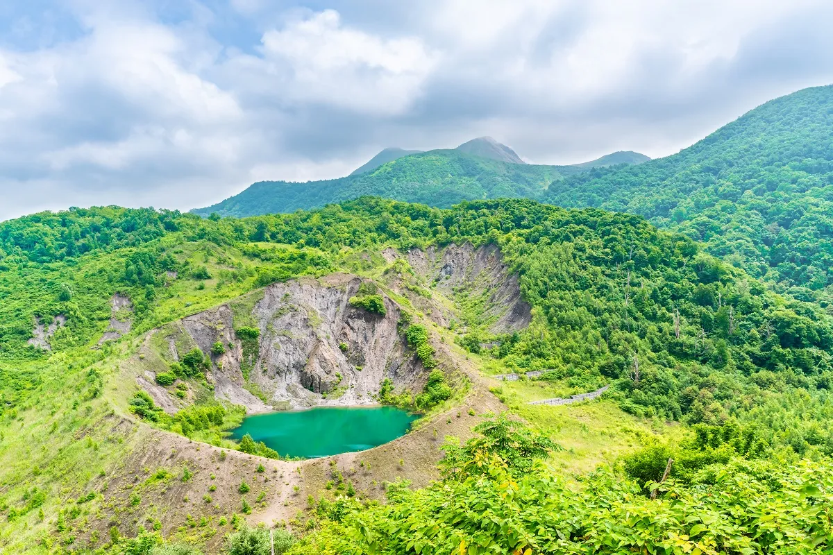 The serene beauty of Lake Toya belies its volcanic origins and ongoing geothermal activity